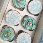 Festive cupcake with snowflake and bauble sprinkles