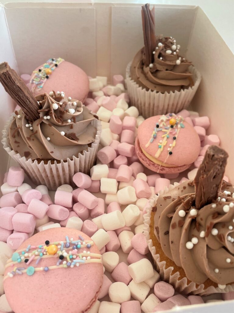 Treat box consisting of your favourite selection of sweet treats from brownies, macarons, cupcakes and doughnuts