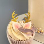 Reindeer Cupcake covered in smooth swiss meringue buttercream decorated with edible ears and snowflake