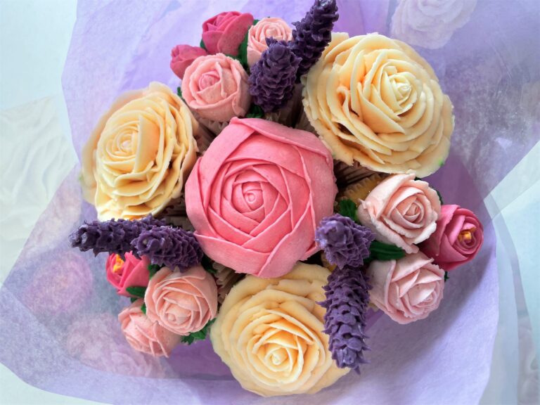 Bouquet of 7 beautifully hand piped floral cupcakes