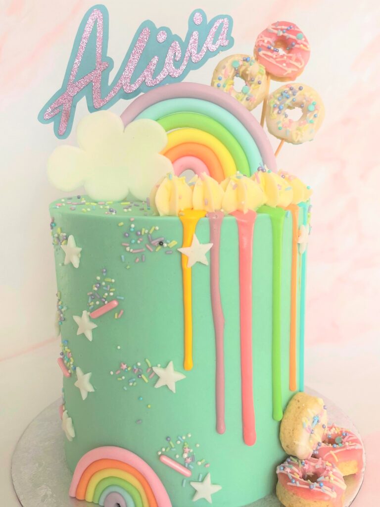 Rainbow Pastel rainbow with colourful drips and fun mini doughnuts